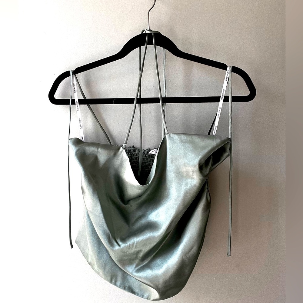 Beautiful sage green Calvin Klein silk top with strings
